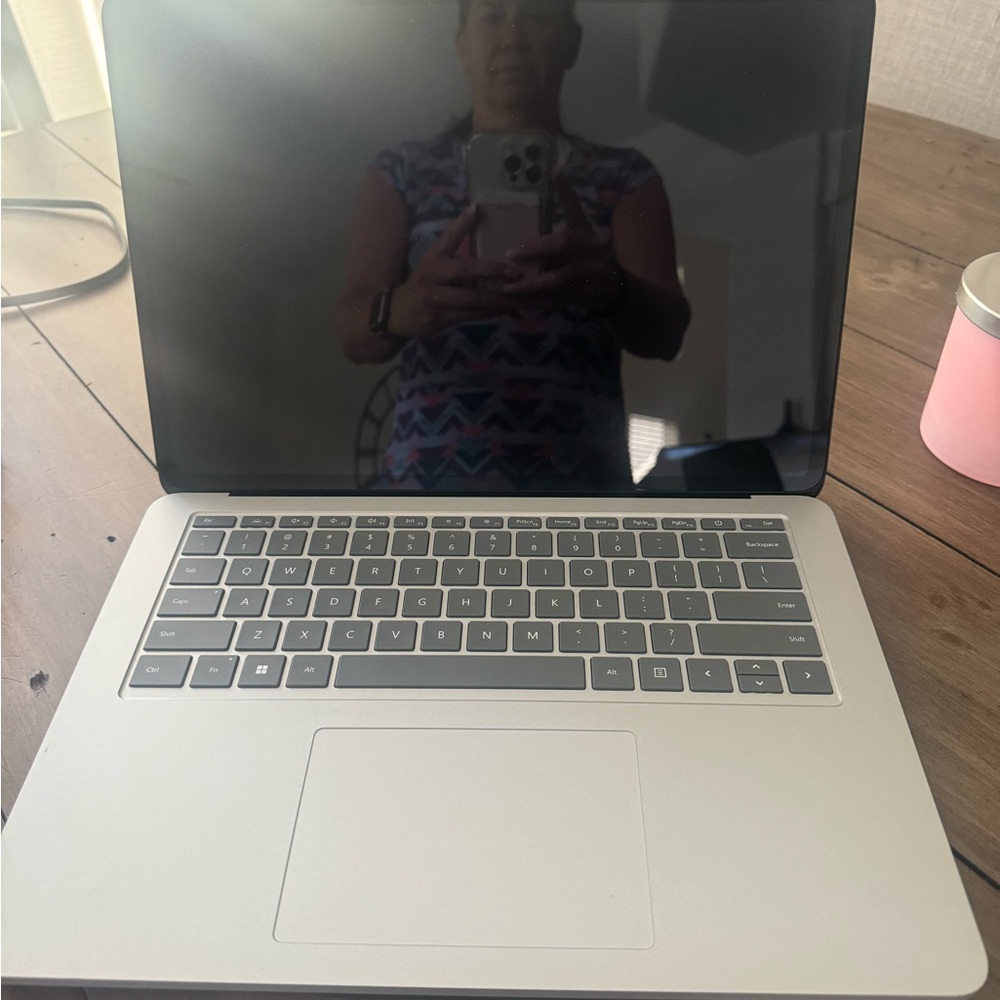 Microsoft Surface Studio Laptop with 14.4” screen.  Includes slim pen.